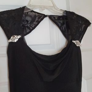 Black evening gown with lace shoulders